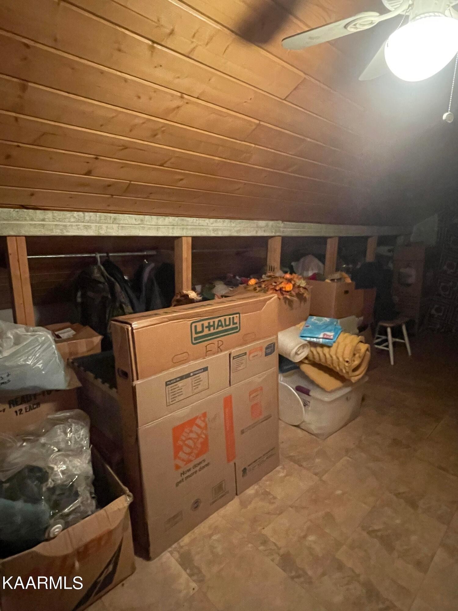 3879 Roan Creek Road Lobelville, TN 37097 - Photo 35 of 45 a room with storage and utility