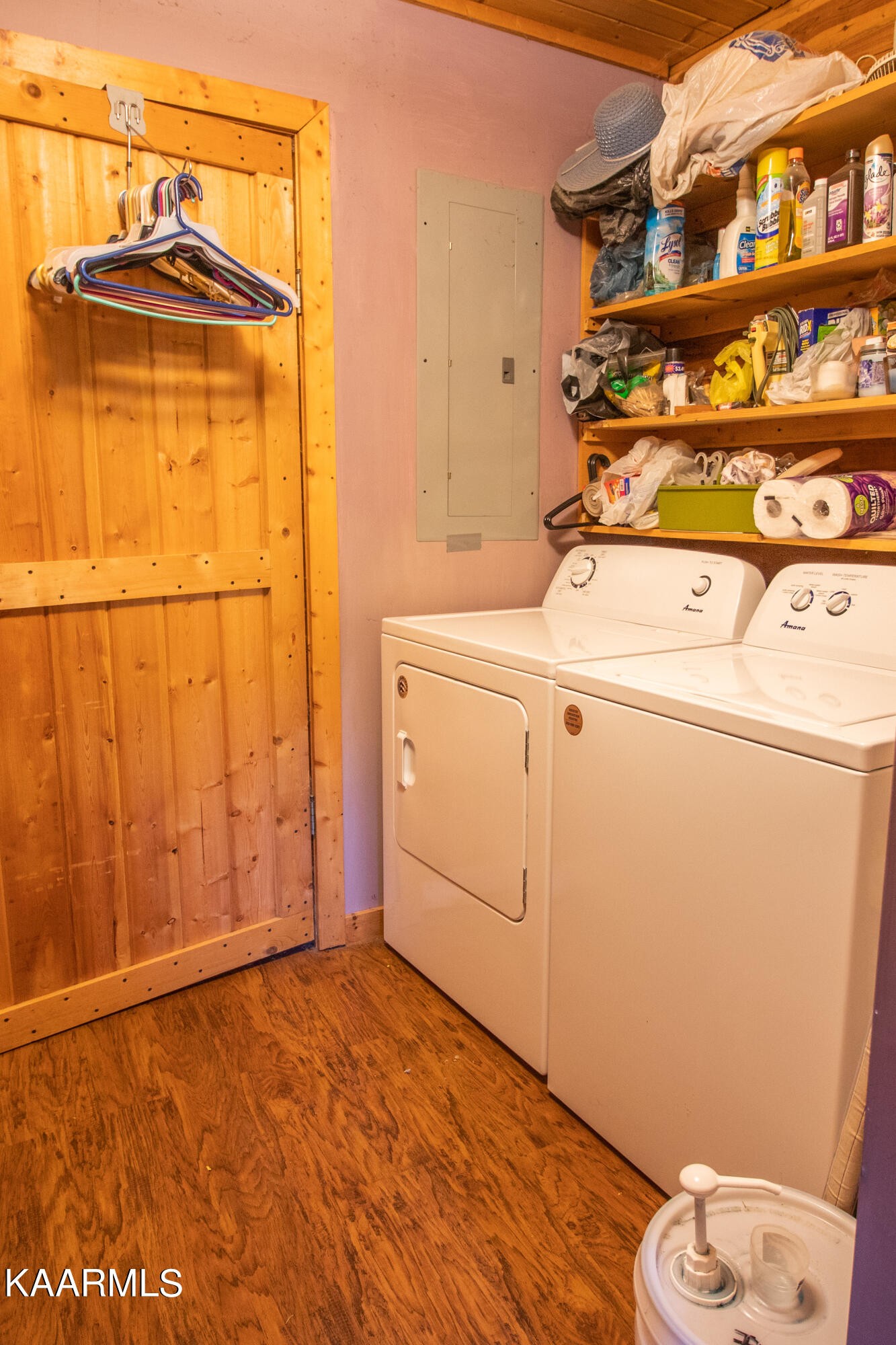 3879 Roan Creek Road Lobelville, TN 37097 - Photo 45 of 45 a utility room with dryer and washer