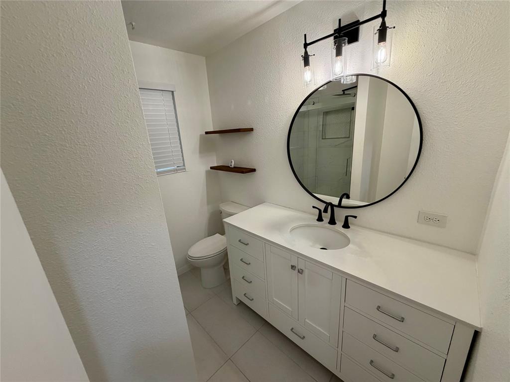 1606 North O'Connor Road Irving, TX 75061 - Photo 12 of 17 2nd Bathroom