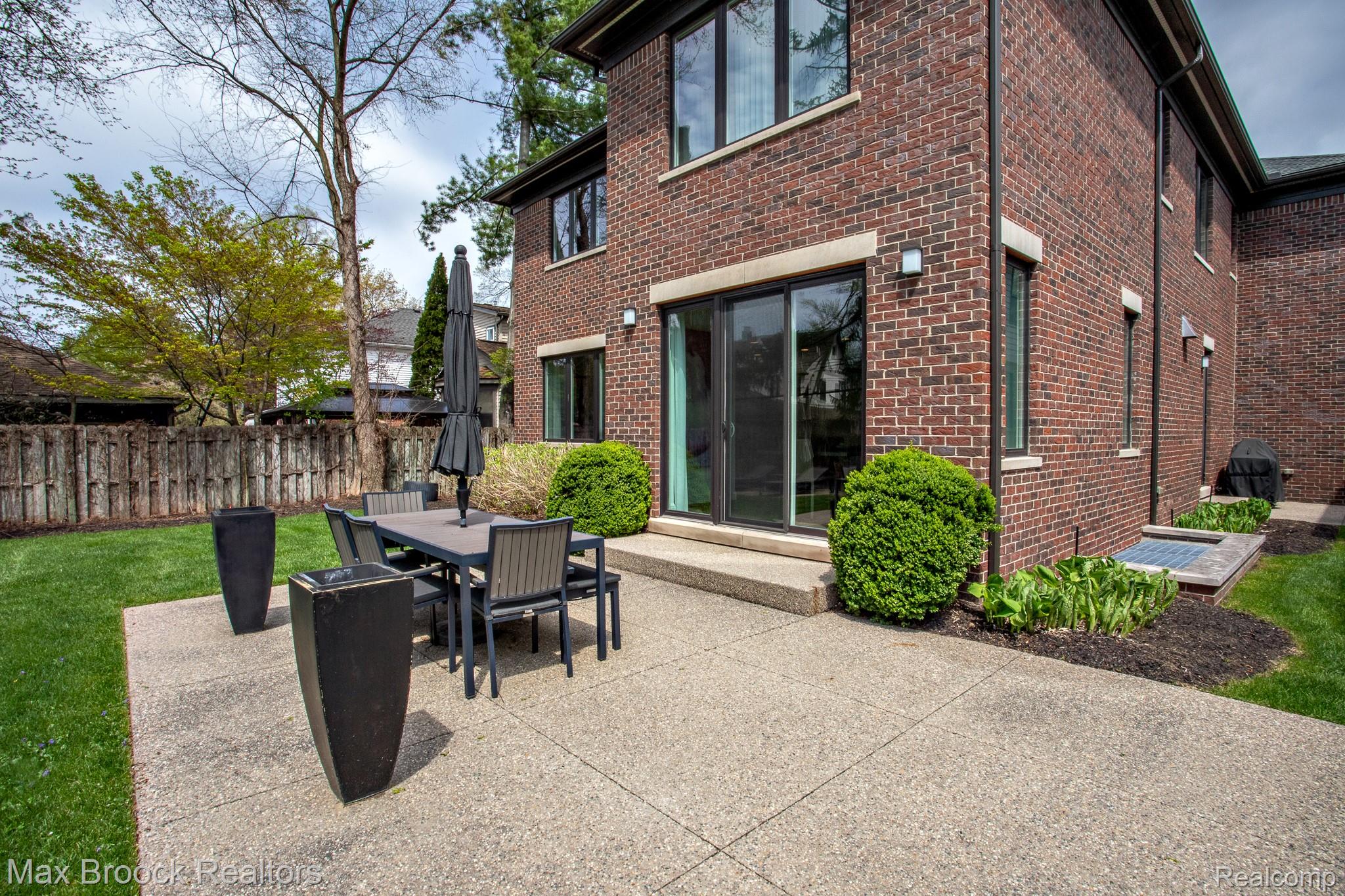 25925 York Road Royal Oak, MI 48067 - Photo 84 of 88 Back of property with brick siding, outdoor dining area, and a patio