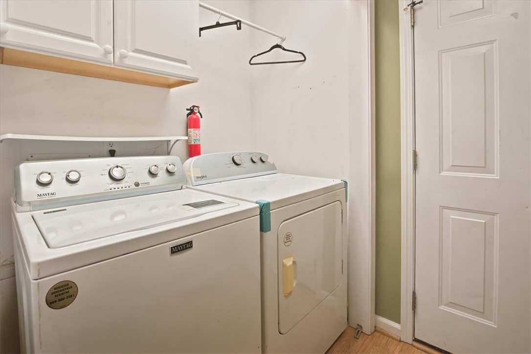 520 Sharon Lane Seneca, SC 29678 - Photo 21 of 48 A well-appointed laundry area offers convenient appliance access and overhead storage.