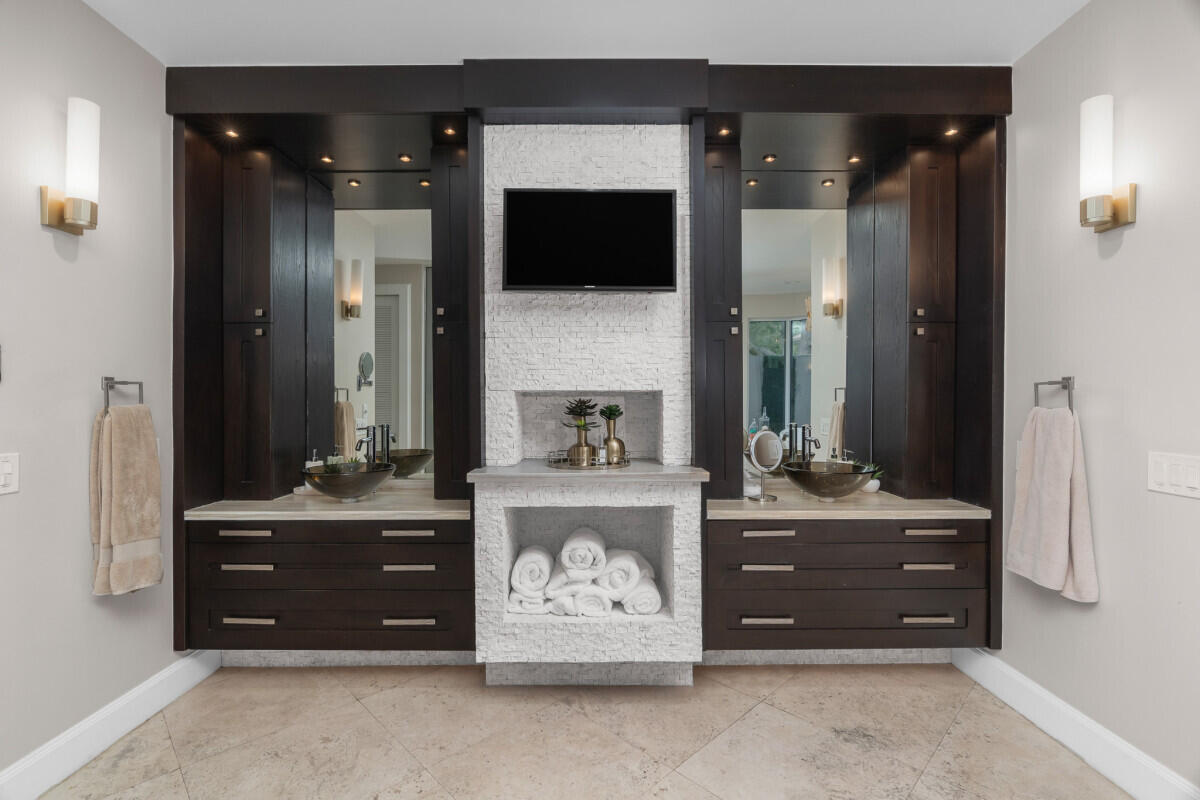 3500 Windmill Ranch Road Weston, FL 33331 - Photo 29 of 47 a room with a cabinet and a mirror