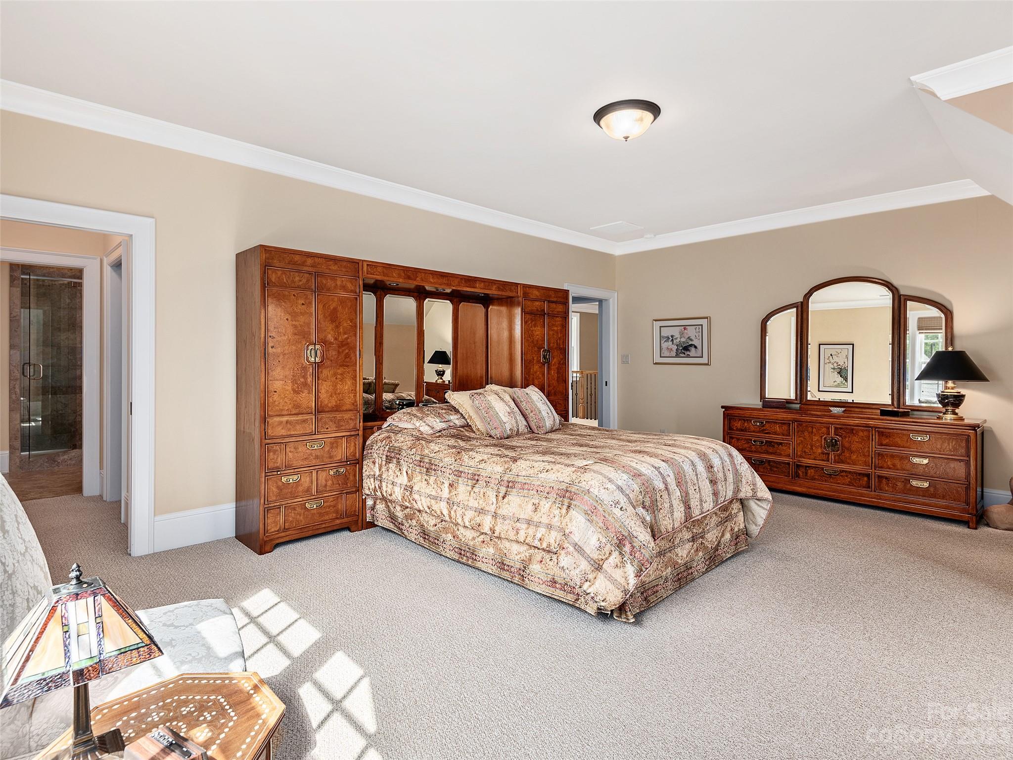 113 Willow Farm Road Fairview, NC 28730 - Photo 26 of 48 a bedroom with a bed and window