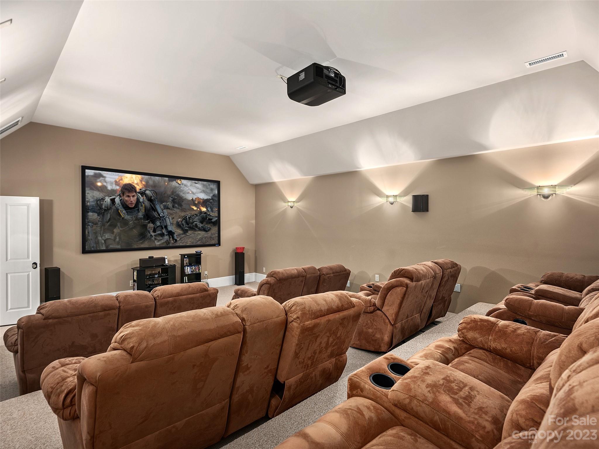 113 Willow Farm Road Fairview, NC 28730 - Photo 38 of 48 a living room with furniture a ceiling fan and a large window