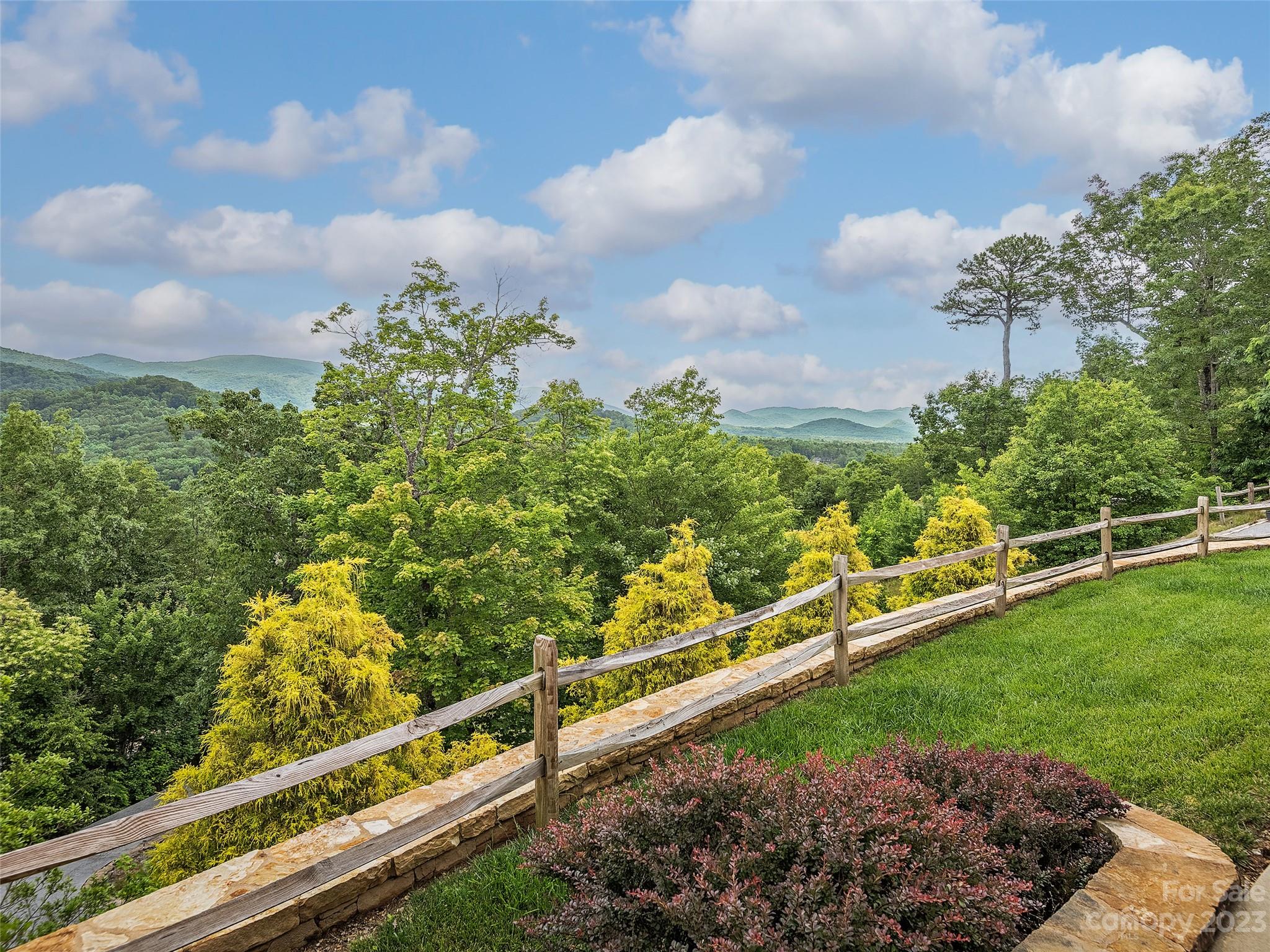 113 Willow Farm Road Fairview, NC 28730 - Photo 45 of 48 a view of a yard with wooden fence