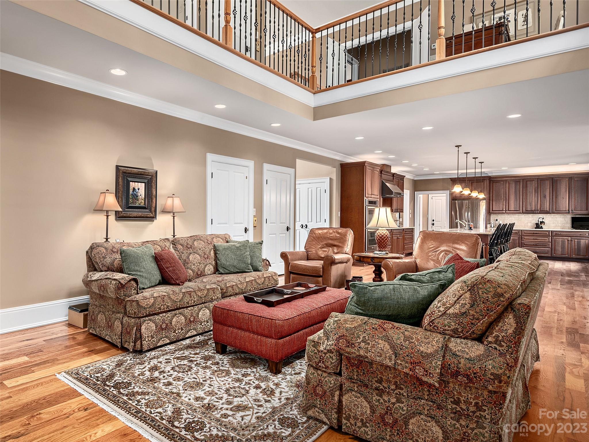 113 Willow Farm Road Fairview, NC 28730 - Photo 7 of 48 a living room with furniture and a view of kitchen