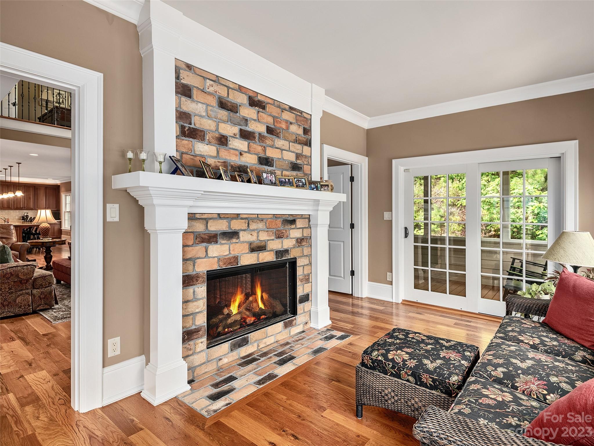 113 Willow Farm Road Fairview, NC 28730 - Photo 9 of 48 a living room with furniture and a fireplace