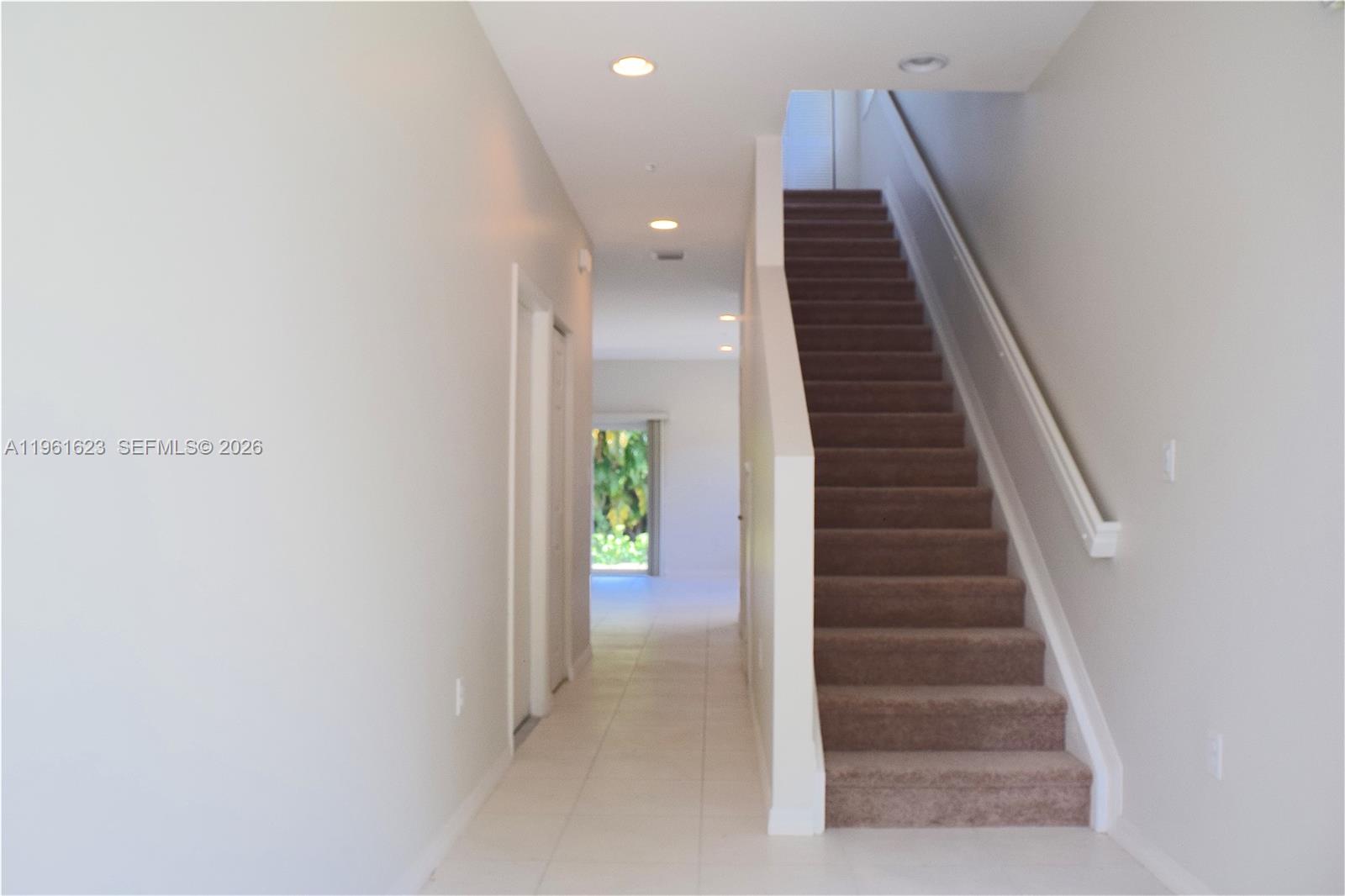 8416 West McNab Road, Unit 8416 Tamarac, FL 33321 - Photo 9 of 25 a view of hallway with stairs