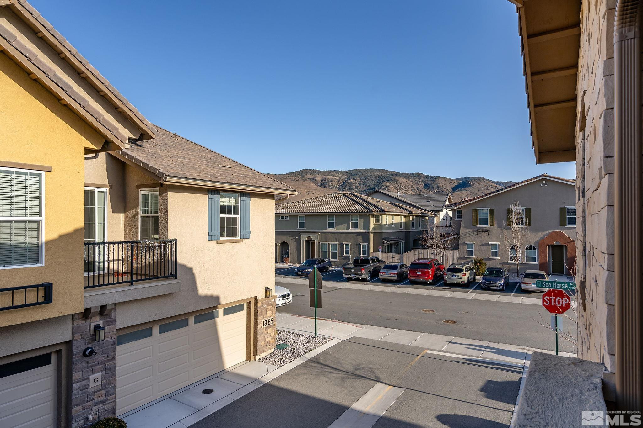 1855 Sea Horse Road, Unit A Reno, NV 89521 - Photo 20 of 32 a cars parked in front of a building