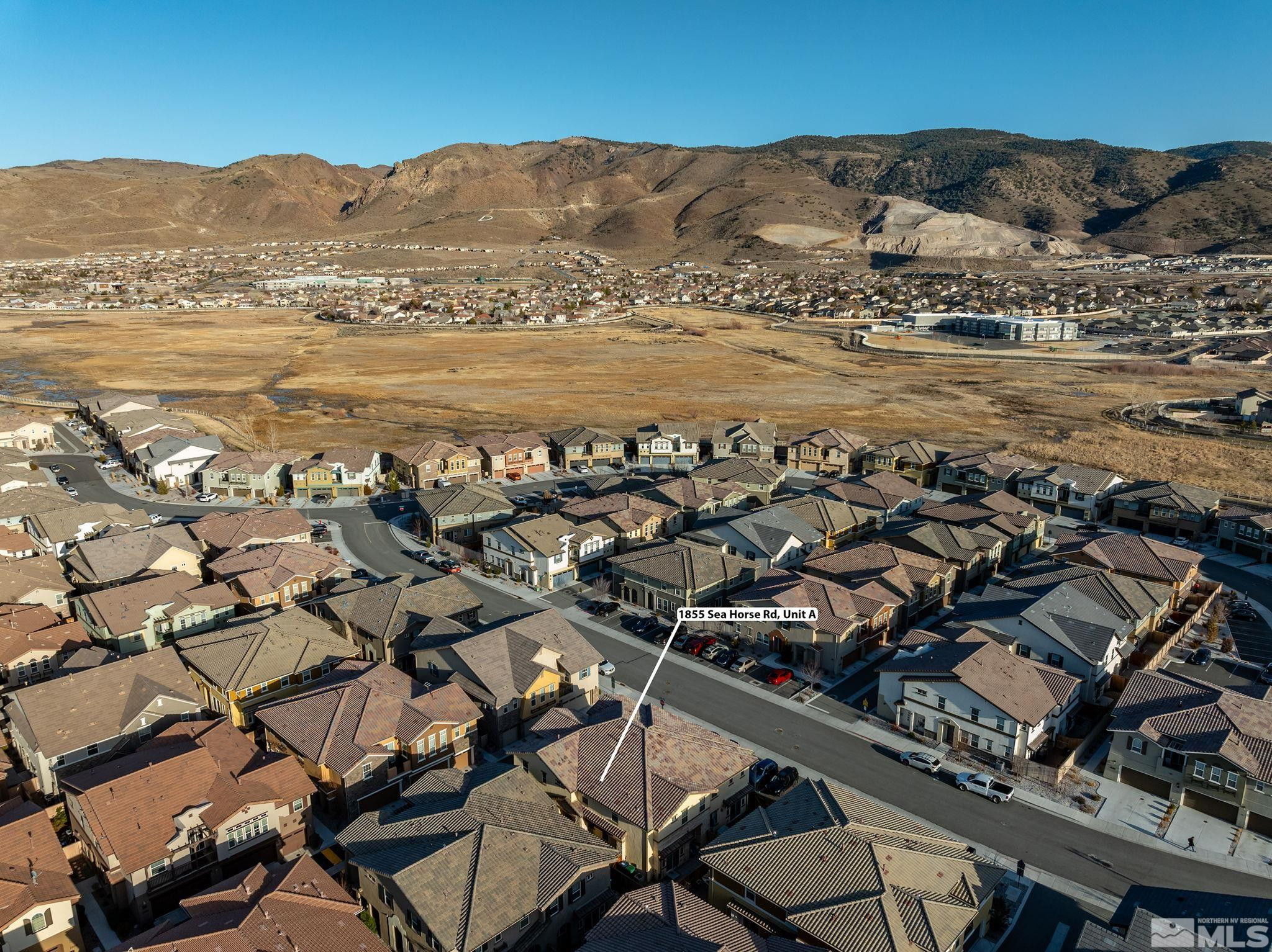 1855 Sea Horse Road, Unit A Reno, NV 89521 - Photo 26 of 32 an aerial view of residential building and ocean view
