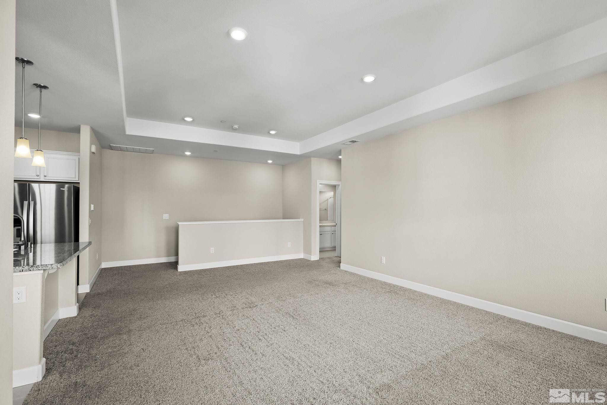 1855 Sea Horse Road, Unit A Reno, NV 89521 - Photo 6 of 32 a view of an empty room