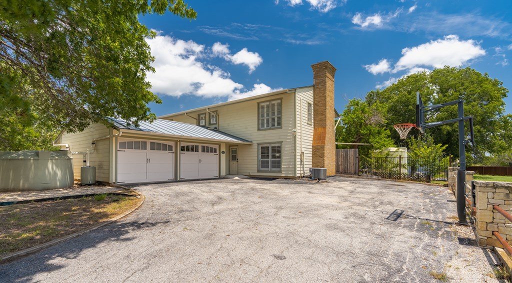 208 Front Street Comfort, TX 78013 - Photo 5 of 47 Attached garage and side entry
