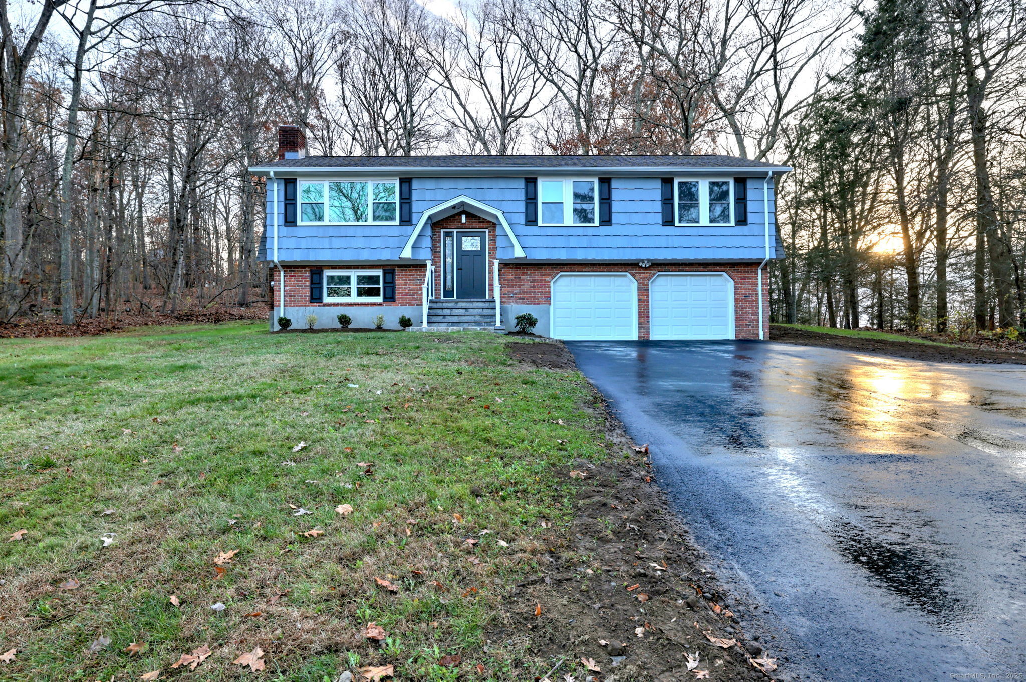 5 Robert Frost Road Shelton, CT 06484 - Photo 1 of 1 a front view of a house with garden