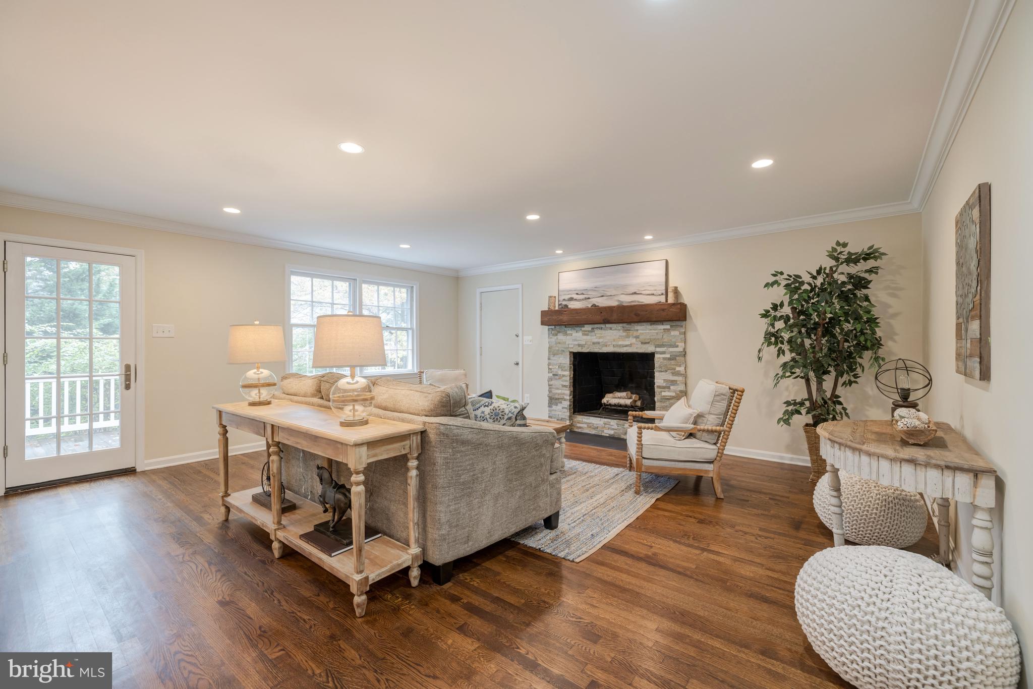 8212 Coach Street Potomac, MD 20854 - Photo 12 of 31 Family Room with Stacked Stone Wood-Burning Firepl