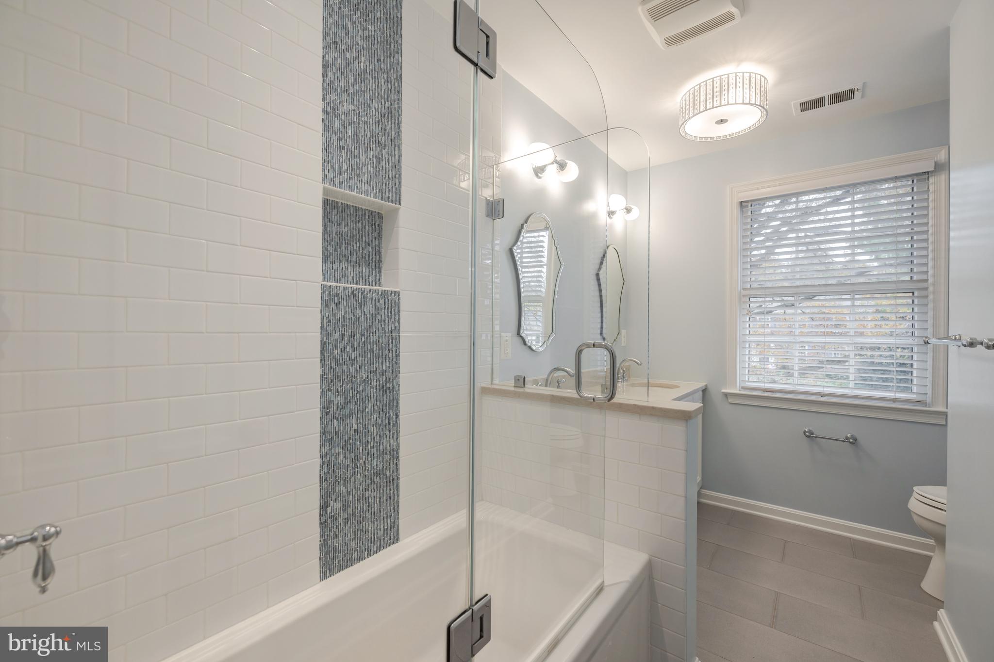8212 Coach Street Potomac, MD 20854 - Photo 19 of 31 Full Bathroom with Shower & Tub