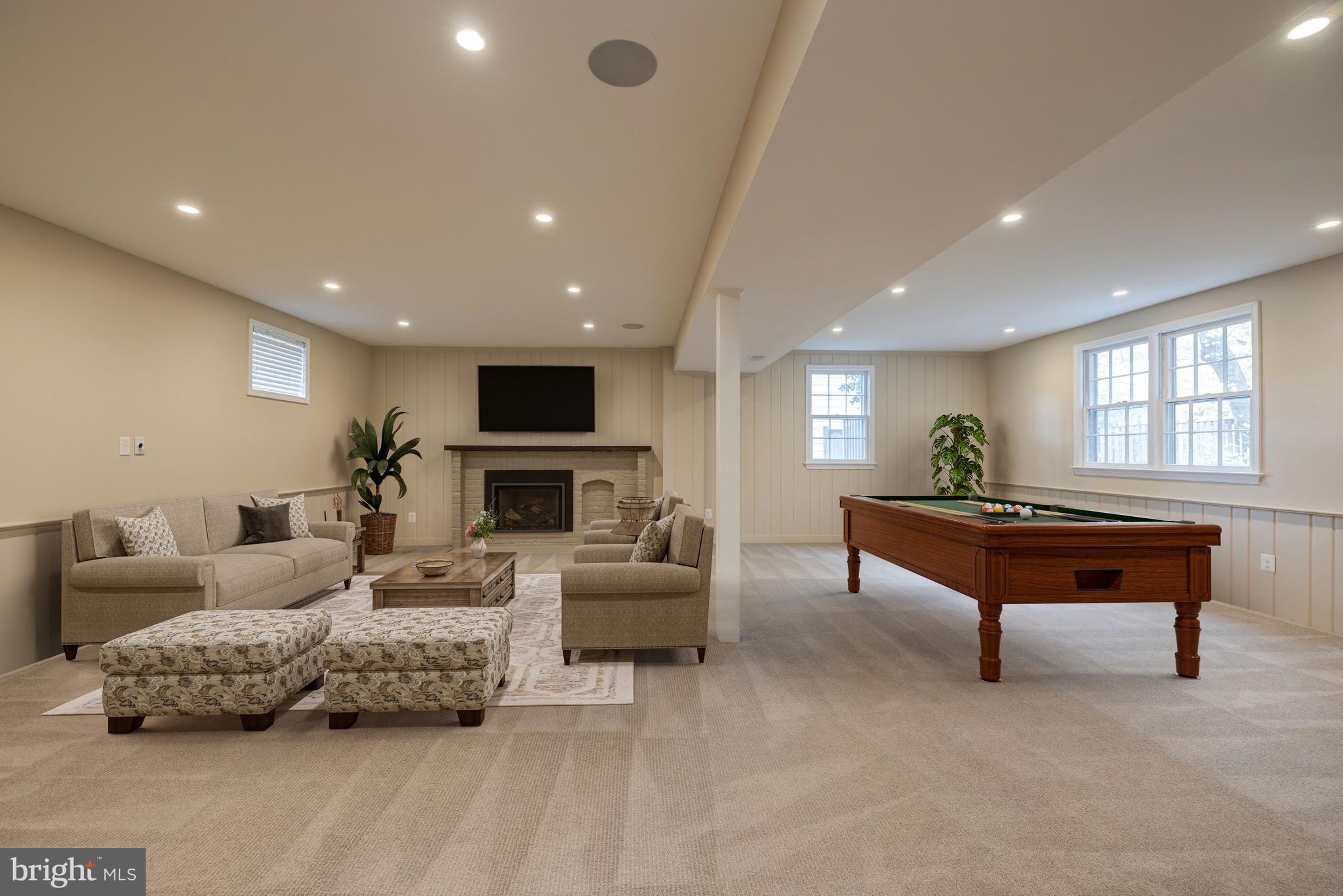 8212 Coach Street Potomac, MD 20854 - Photo 27 of 31 Lower Level Living Area with Elevated Ceilings