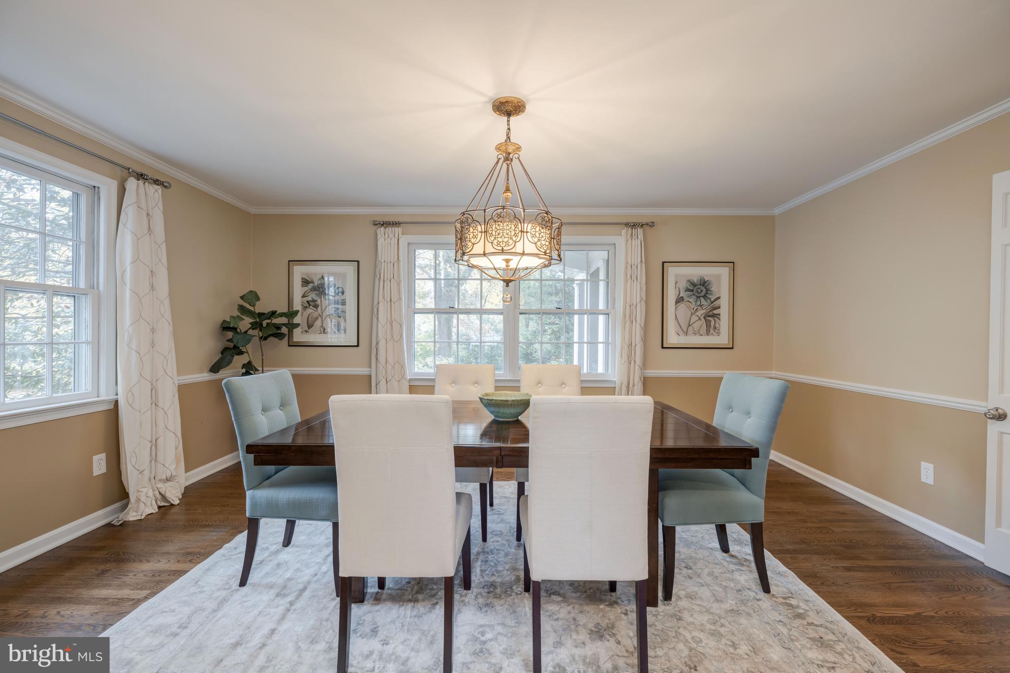 8212 Coach Street Potomac, MD 20854 - Photo 5 of 31 Dining Room with Crown & Chair Rail Molding