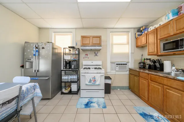 a bedroom with a bed and a shower