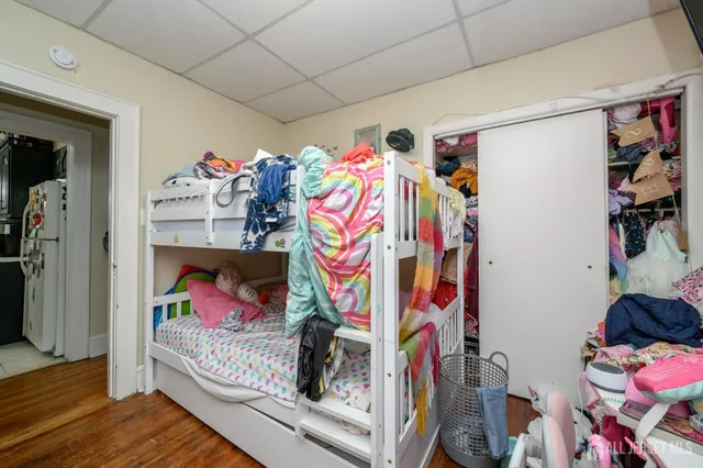 a bathroom with a sink toilet vanity and shower