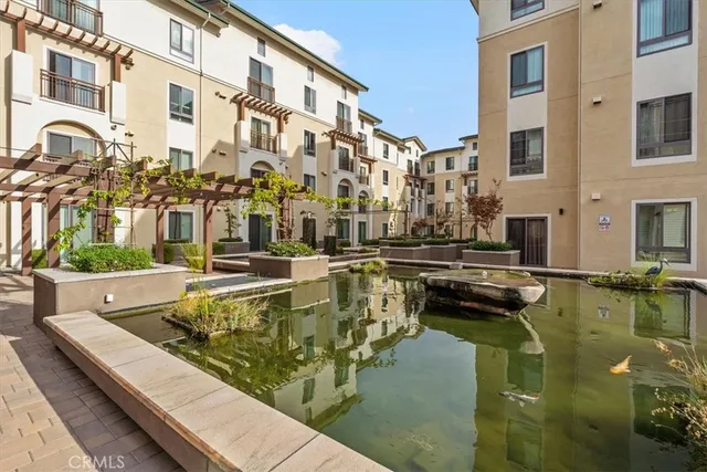 a view of swimming pool with outdoor seating