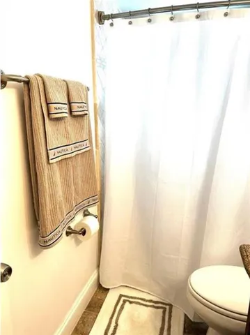 a bathroom with a sink and a toilet