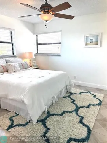 a view of staircase with wooden floor