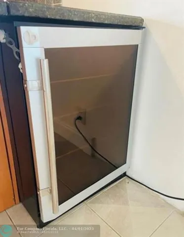 a view of a dining room with furniture and window