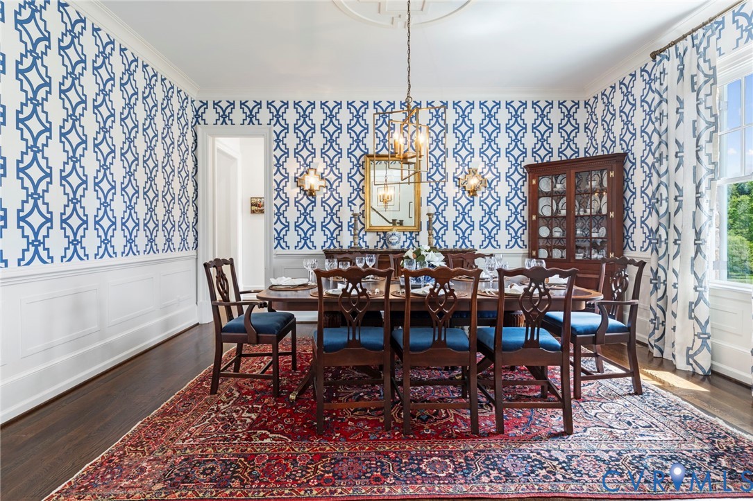 3264 Three Bridge Road Powhatan, VA 23139 - Photo 15 of 78 a view of a dining room with furniture and chandelier
