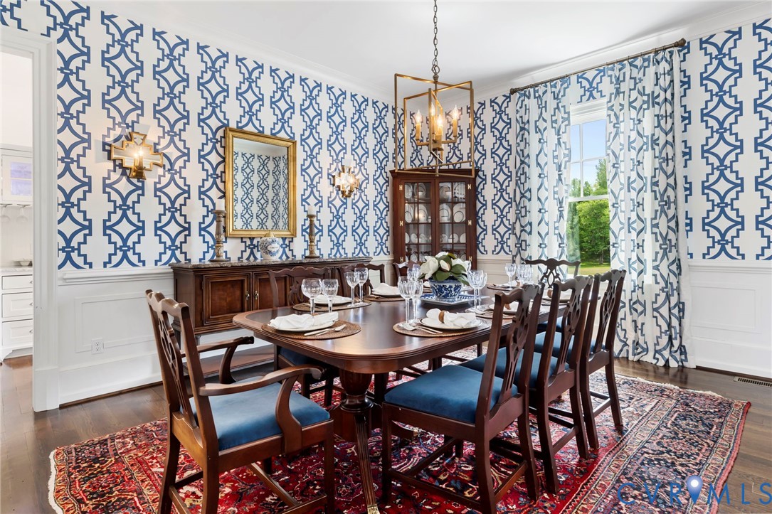 3264 Three Bridge Road Powhatan, VA 23139 - Photo 16 of 78 a view of a dining room with furniture and chandelier