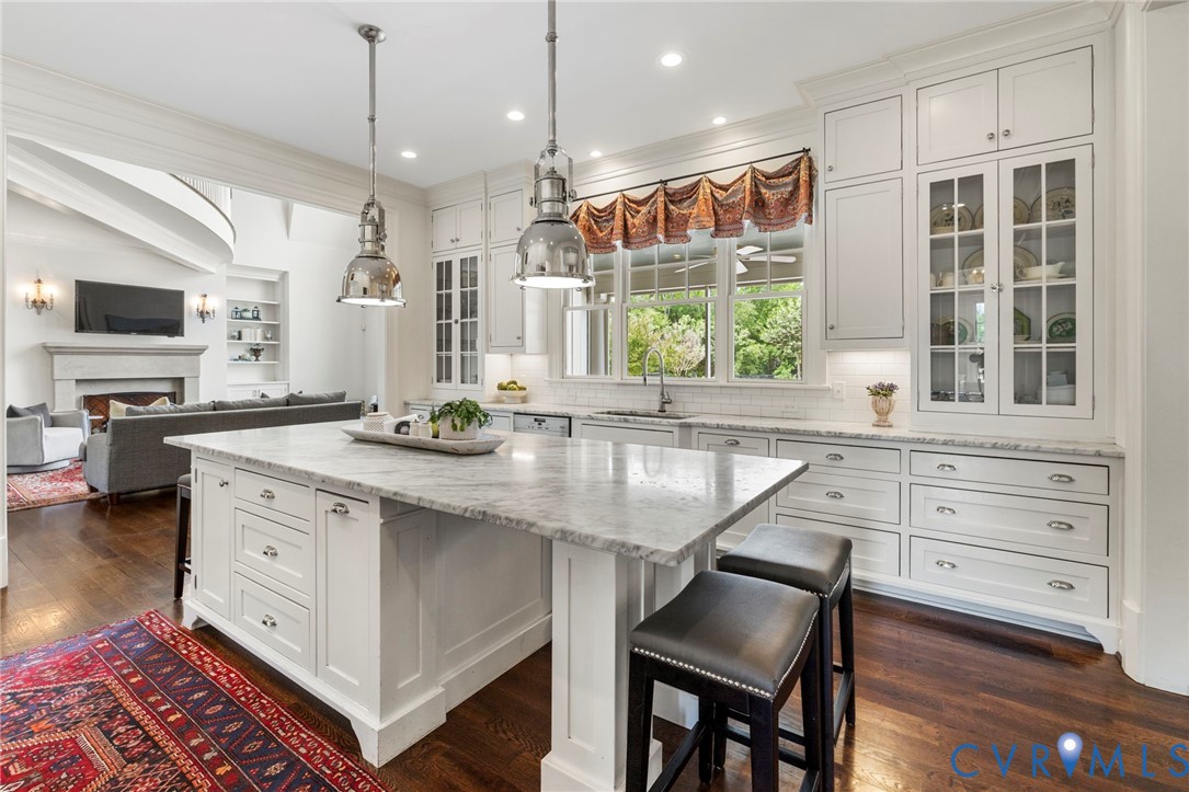 3264 Three Bridge Road Powhatan, VA 23139 - Photo 20 of 78 a kitchen with granite countertop a stove a sink and a refrigerator