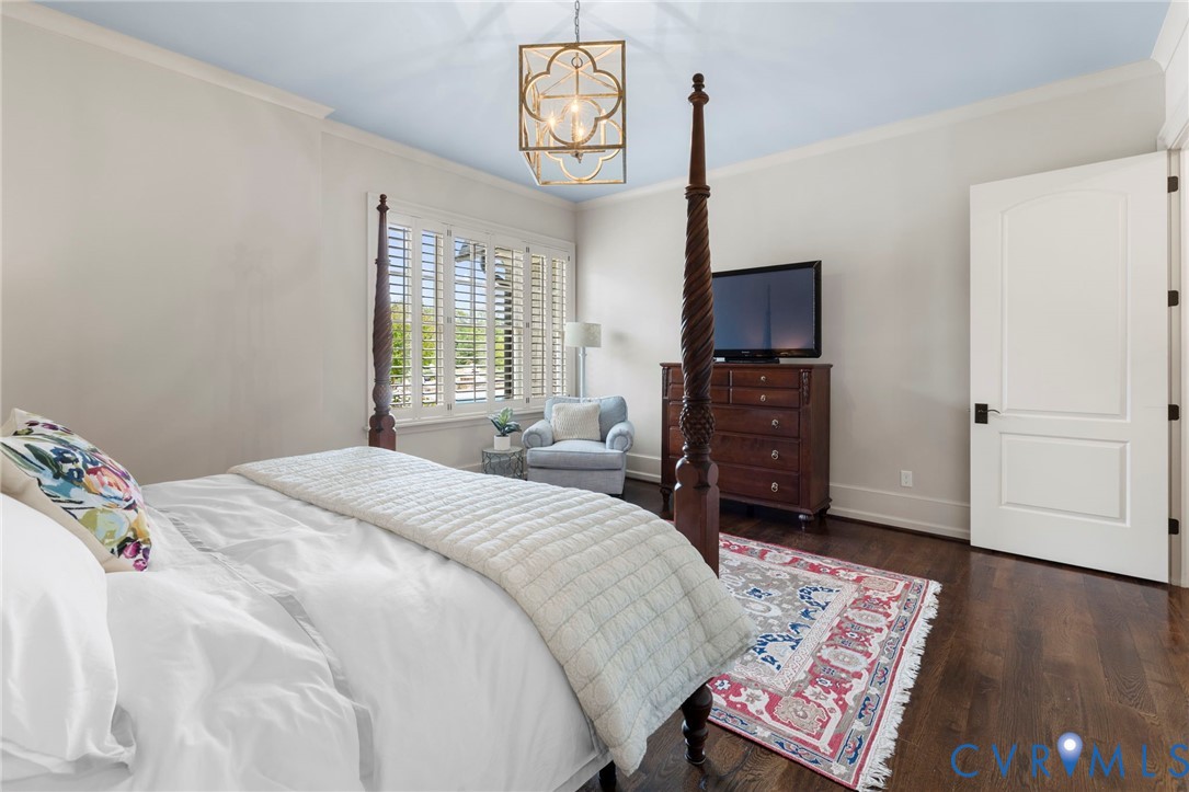 3264 Three Bridge Road Powhatan, VA 23139 - Photo 35 of 78 a bedroom with a bed and wooden floor