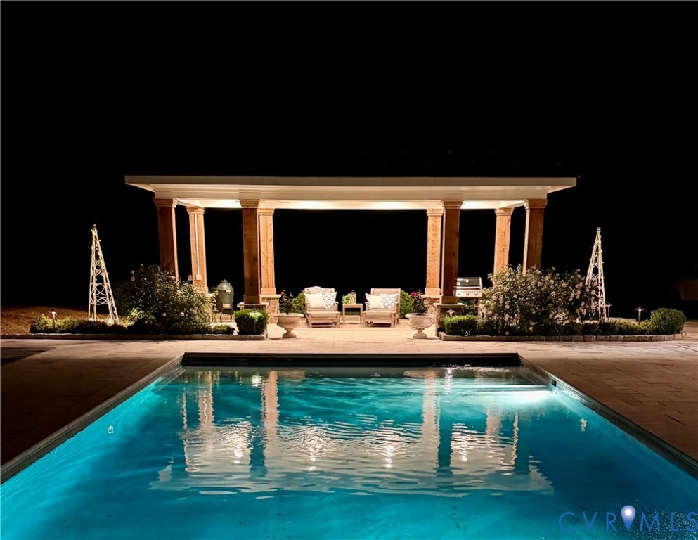 3264 Three Bridge Road Powhatan, VA 23139 - Photo 55 of 78 Night lighting in outdoor pool areas