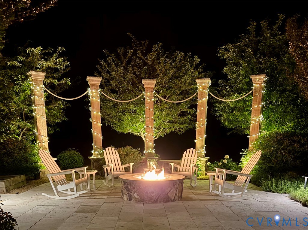 3264 Three Bridge Road Powhatan, VA 23139 - Photo 60 of 78 a view of a patio with table and chairs and potted plants