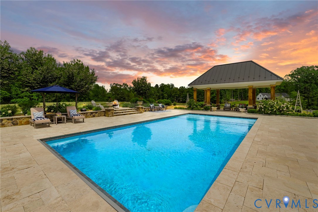 3264 Three Bridge Road Powhatan, VA 23139 - Photo 64 of 78 a swimming pool with outdoor seating and yard