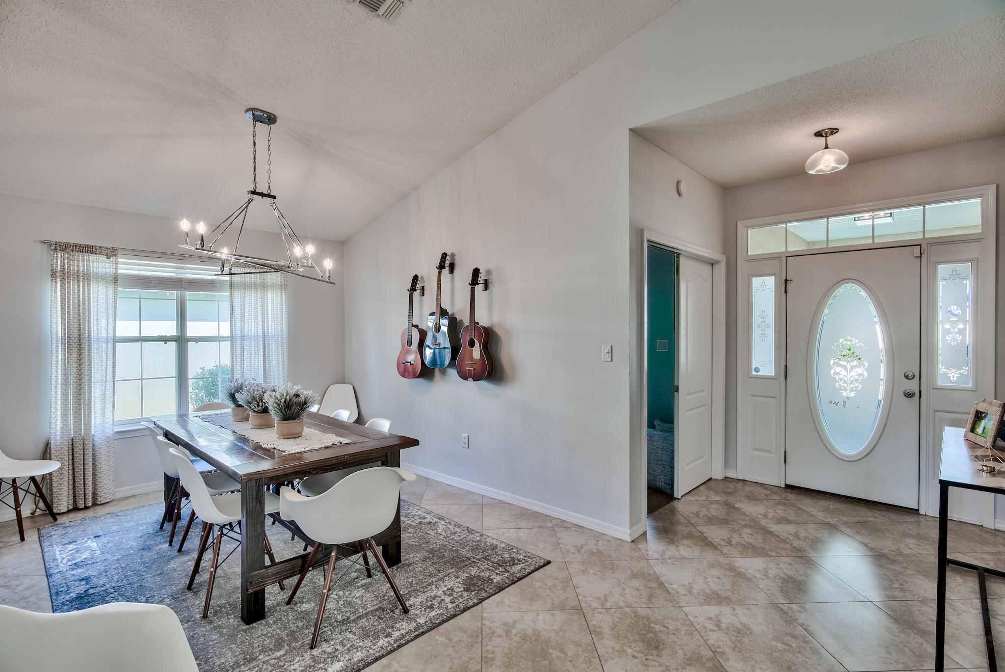 14 East Poplar Way Santa Rosa Beach, FL 32459 - Photo 14 of 30 a view of a dining room with furniture
