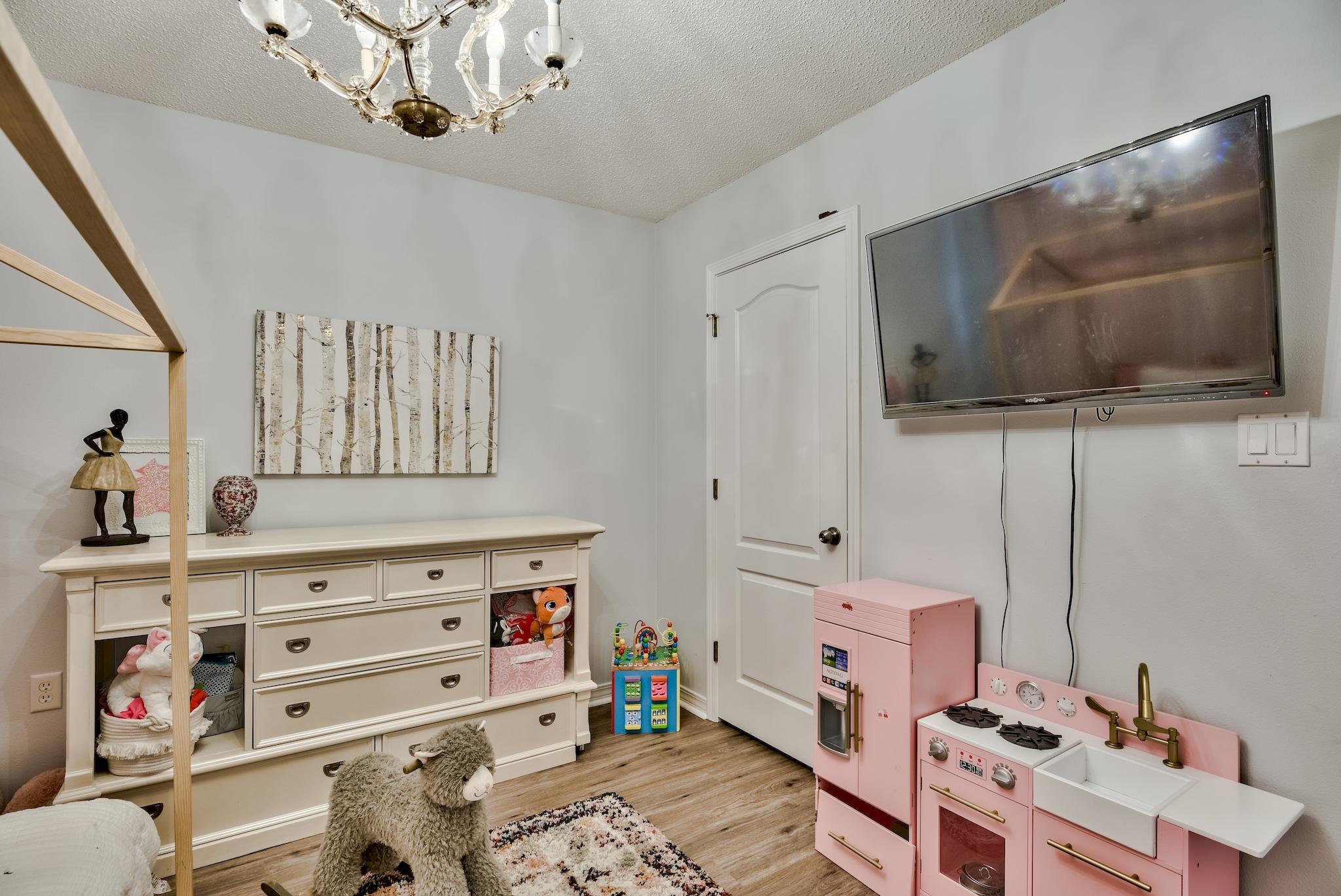 14 East Poplar Way Santa Rosa Beach, FL 32459 - Photo 23 of 30 a living room with furniture and a flat screen tv