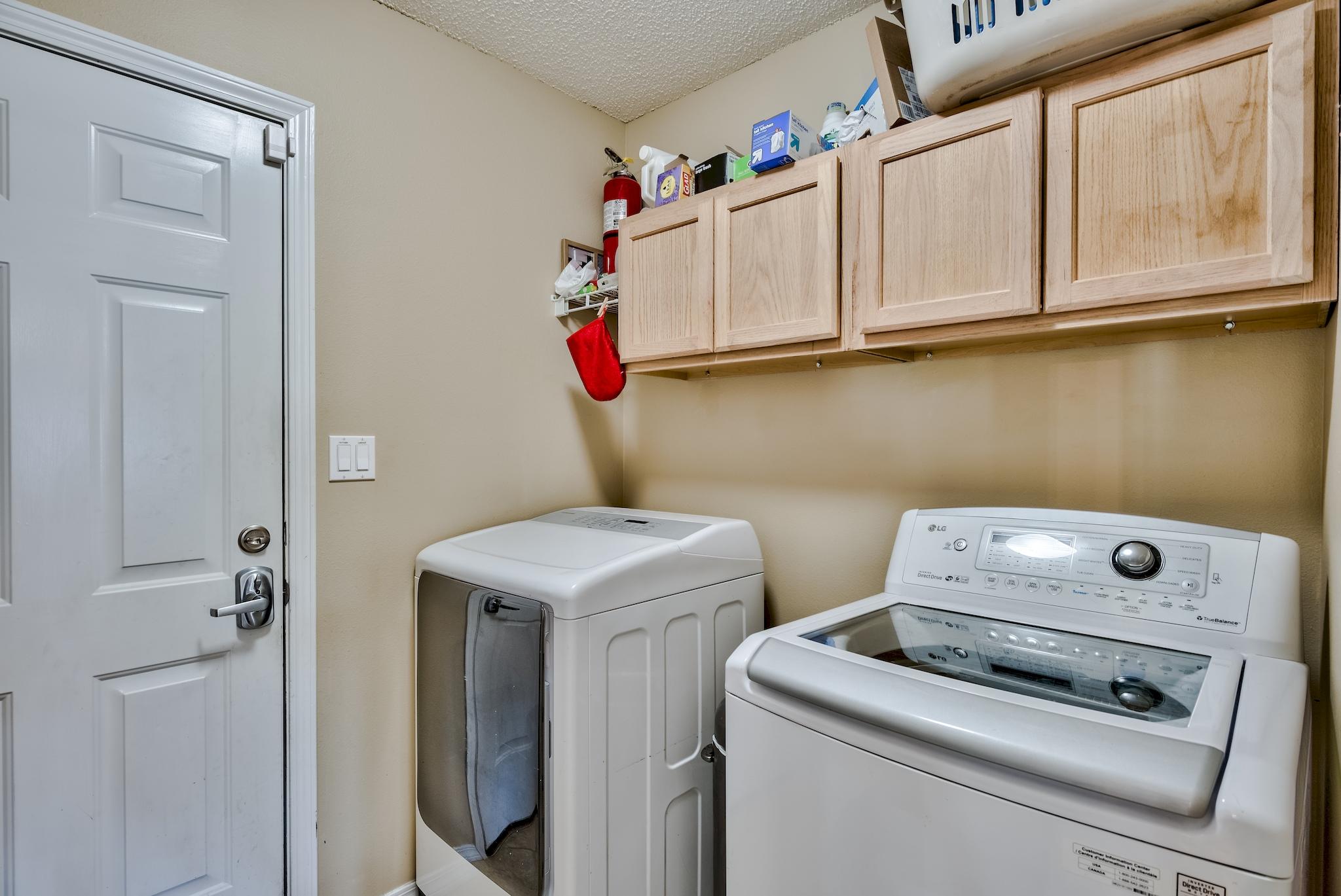 14 East Poplar Way Santa Rosa Beach, FL 32459 - Photo 25 of 30 a utility room with dryer and washer