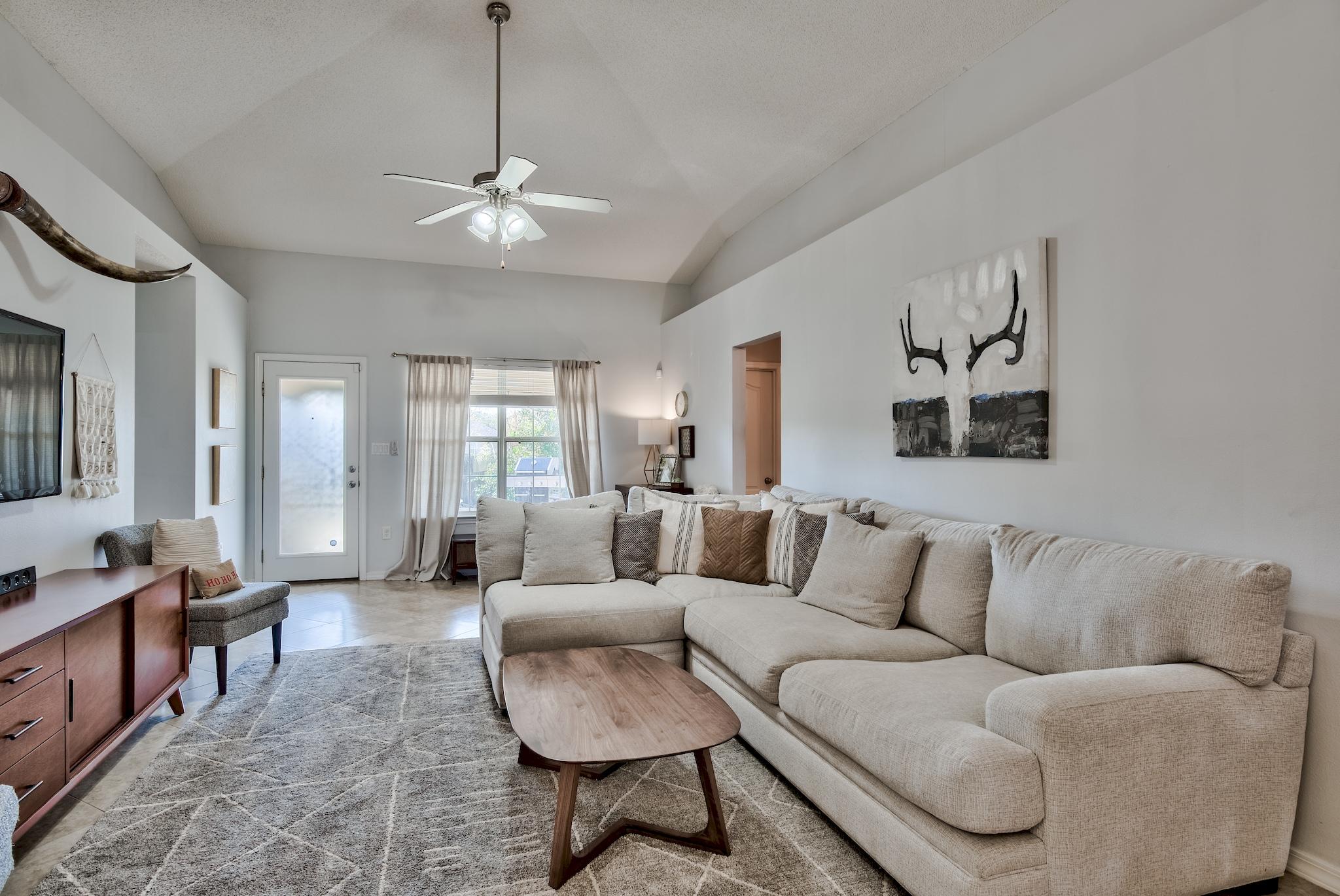 14 East Poplar Way Santa Rosa Beach, FL 32459 - Photo 3 of 30 a living room with furniture and a chandelier