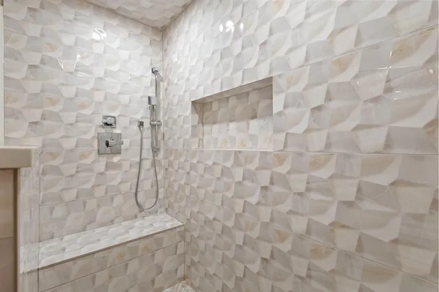 a bathroom with a sink and mirror