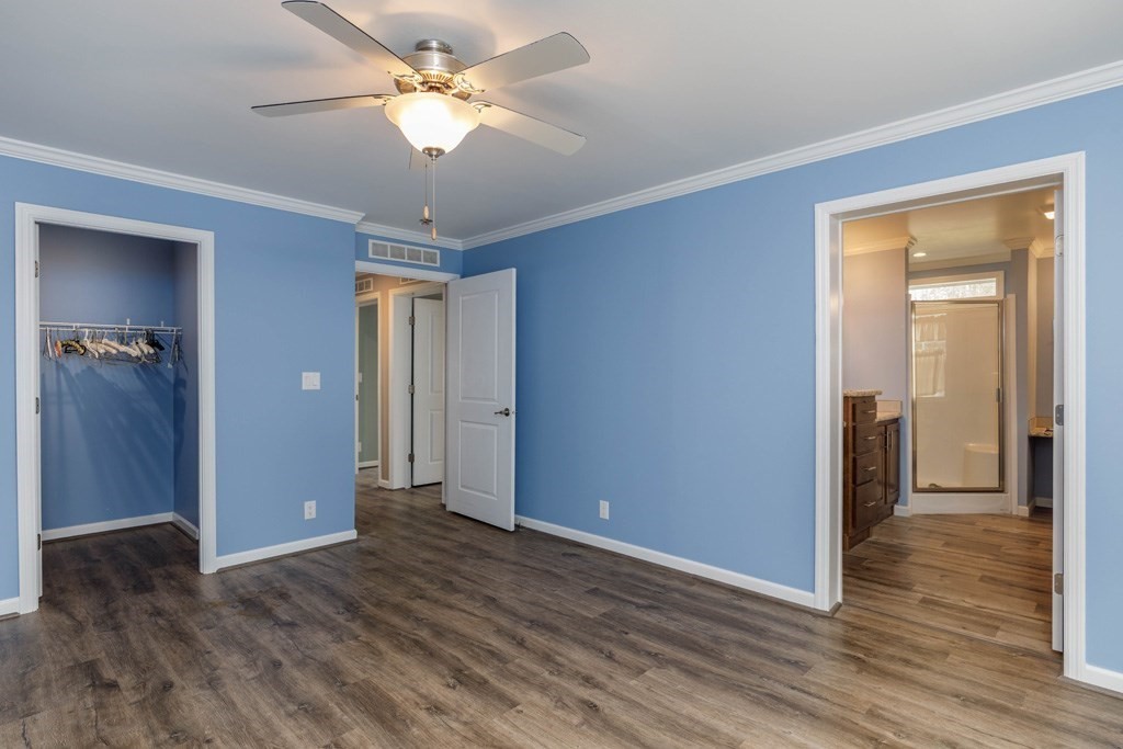 102 Topaz Terrace Gardner, MA 01440 - Photo 9 of 20 a view of an empty room with wooden floor