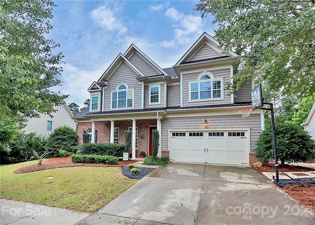 1339 Secret Path Drive Fort Mill, SC 29708 - Photo 1 of 46 a front view of a house with a yard