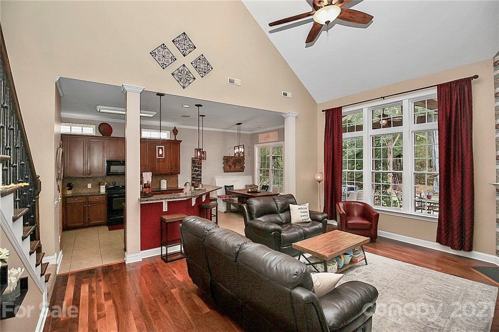 1339 Secret Path Drive Fort Mill, SC 29708 - Photo 20 of 46 a view of a dining room with furniture window and wooden floor