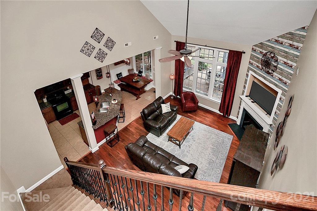 1339 Secret Path Drive Fort Mill, SC 29708 - Photo 24 of 46 a living room with furniture a fireplace and a window