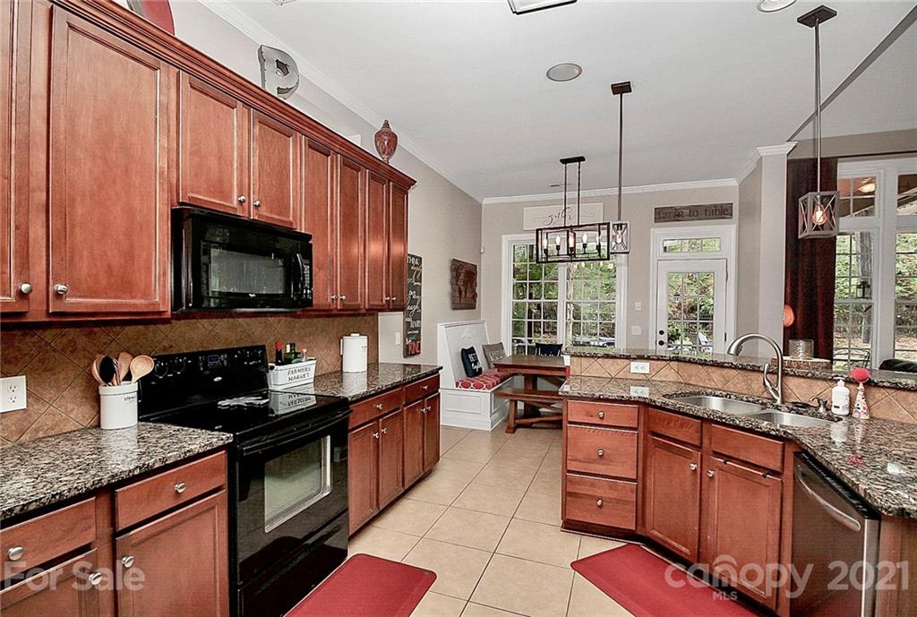 1339 Secret Path Drive Fort Mill, SC 29708 - Photo 28 of 46 a kitchen with granite countertop lots of counter top space