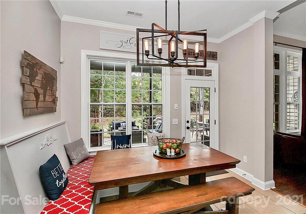 1339 Secret Path Drive Fort Mill, SC 29708 - Photo 30 of 46 a very nice looking dining room with a table and chairs