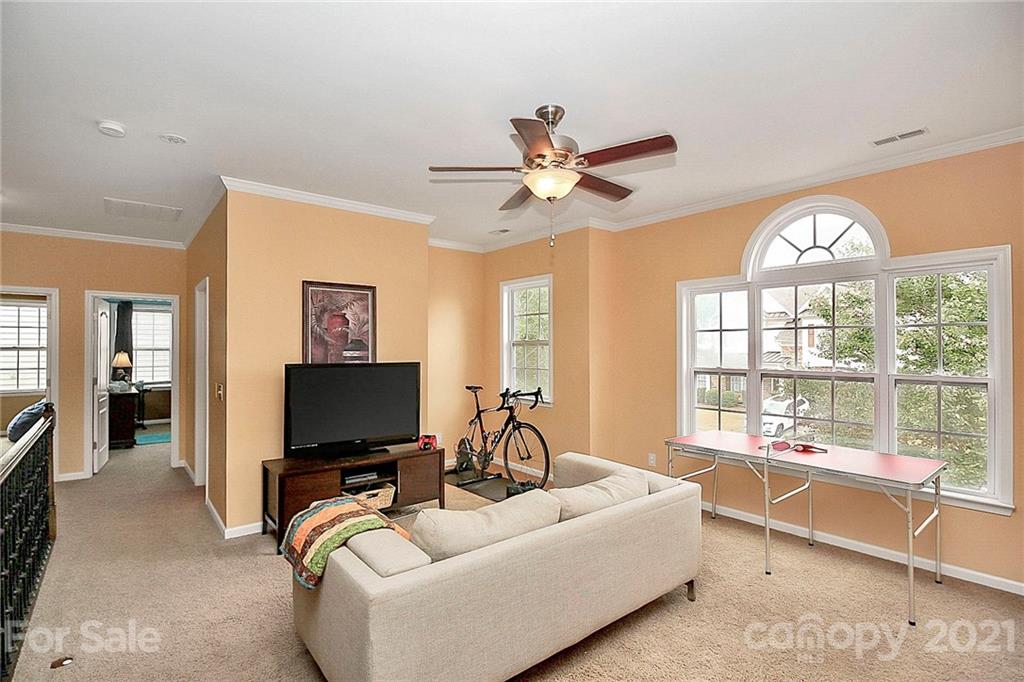 1339 Secret Path Drive Fort Mill, SC 29708 - Photo 39 of 46 a living room with furniture and a large window