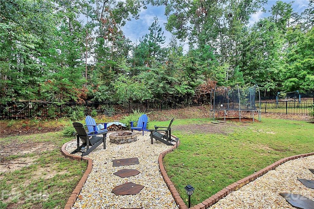 1339 Secret Path Drive Fort Mill, SC 29708 - Photo 7 of 46 a front view of house with yard and outdoor seating