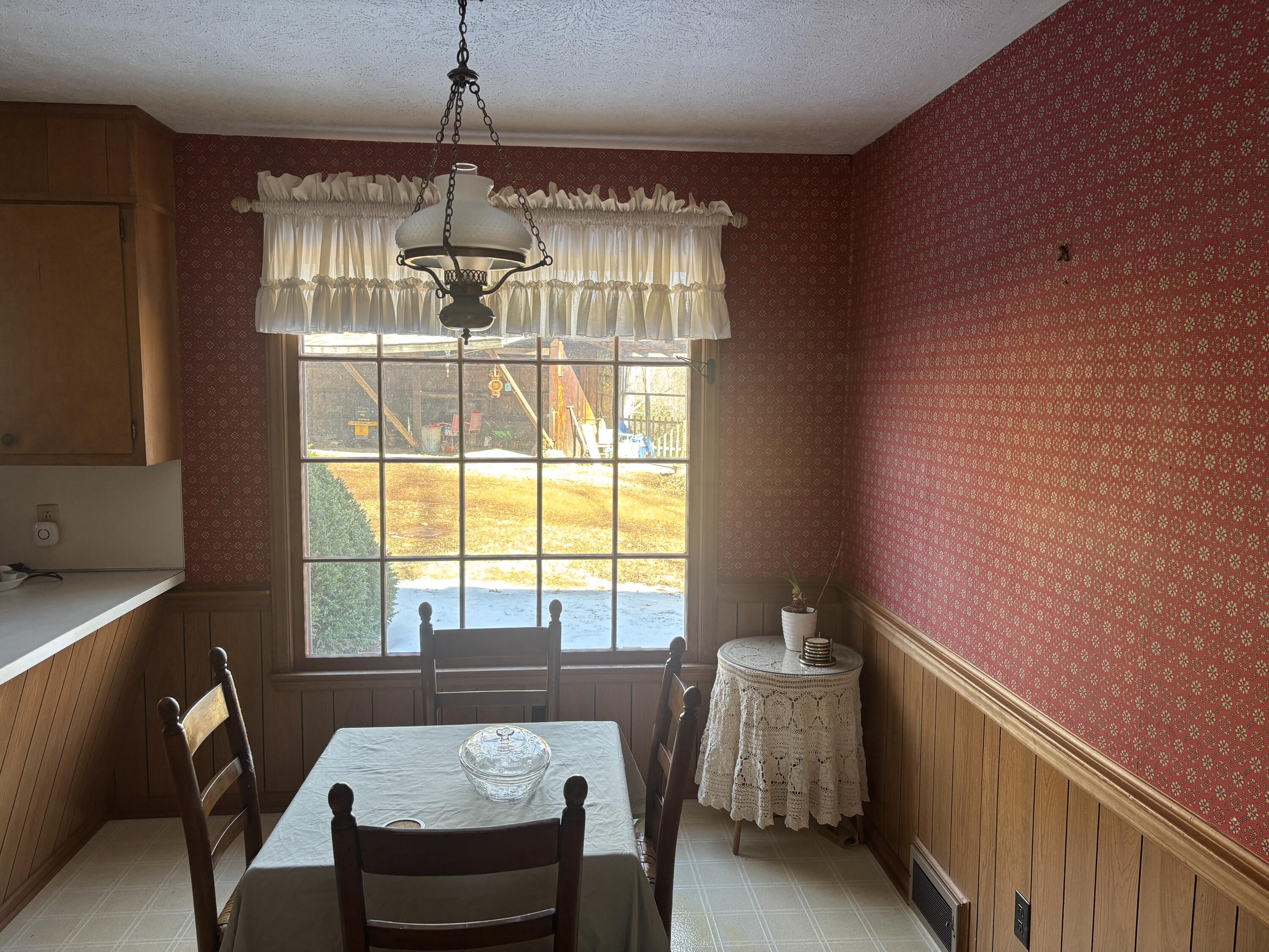 1115 Robin Ridge Road Henry, VA 24102 - Photo 20 of 30 a dining room with furniture and window