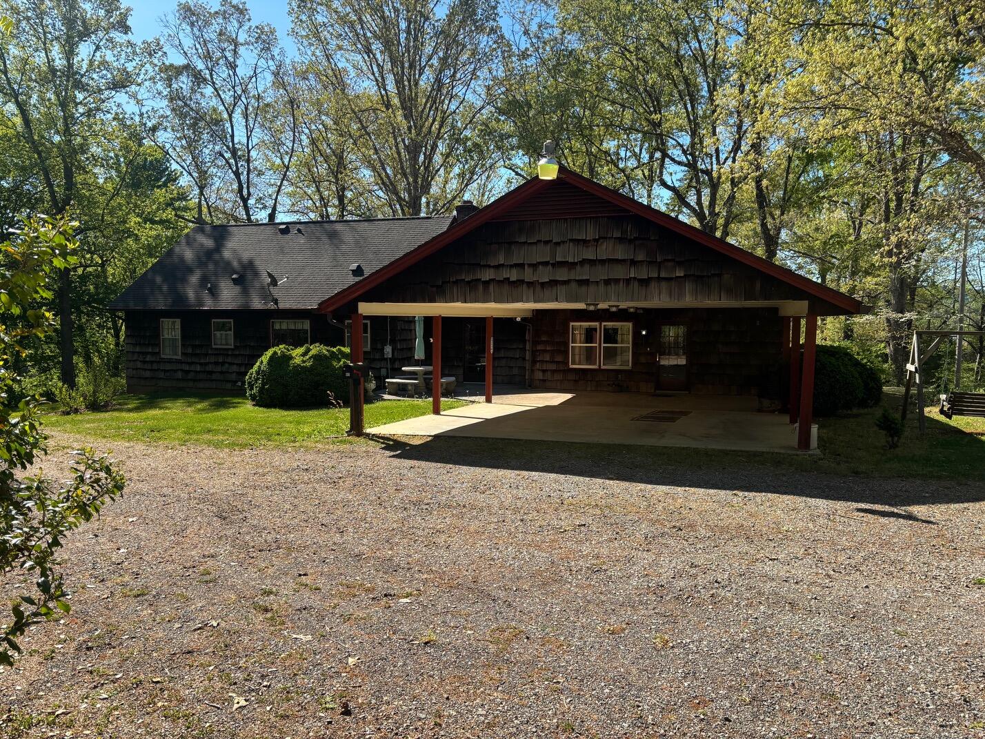 1115 Robin Ridge Road Henry, VA 24102 - Photo 26 of 30 a front view of a house with a yard