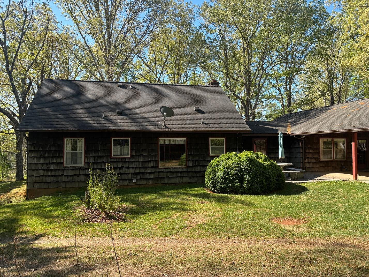 1115 Robin Ridge Road Henry, VA 24102 - Photo 27 of 30 a front view of a house with garden